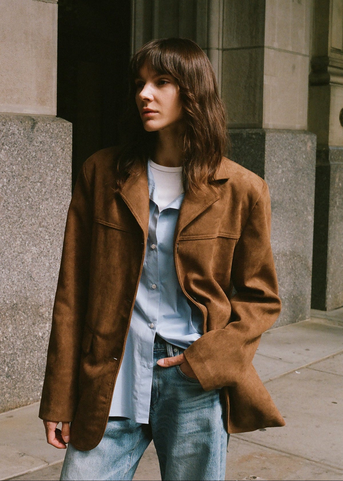 Women wearing camel faux suede blazer 