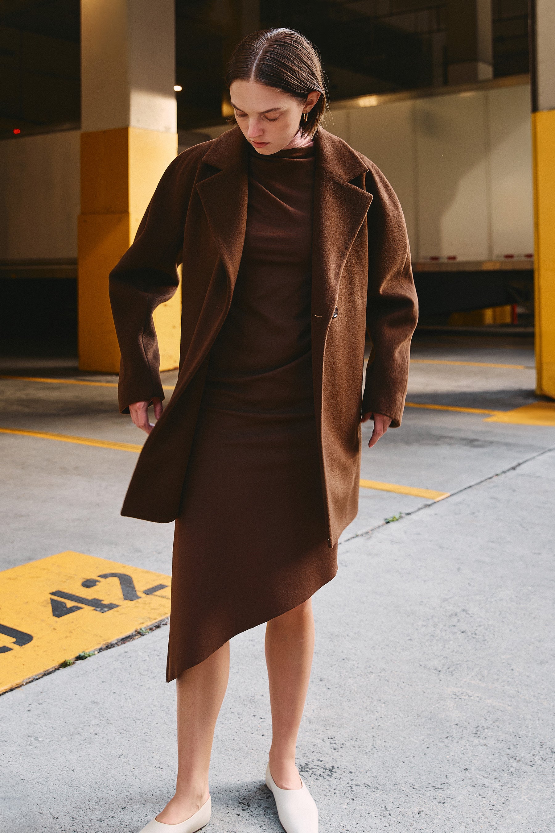 Women's half coat in the softest plaited cashmere-wool blend with unique back detail, crafted in brown double-face fabric for a luxurious look and feel